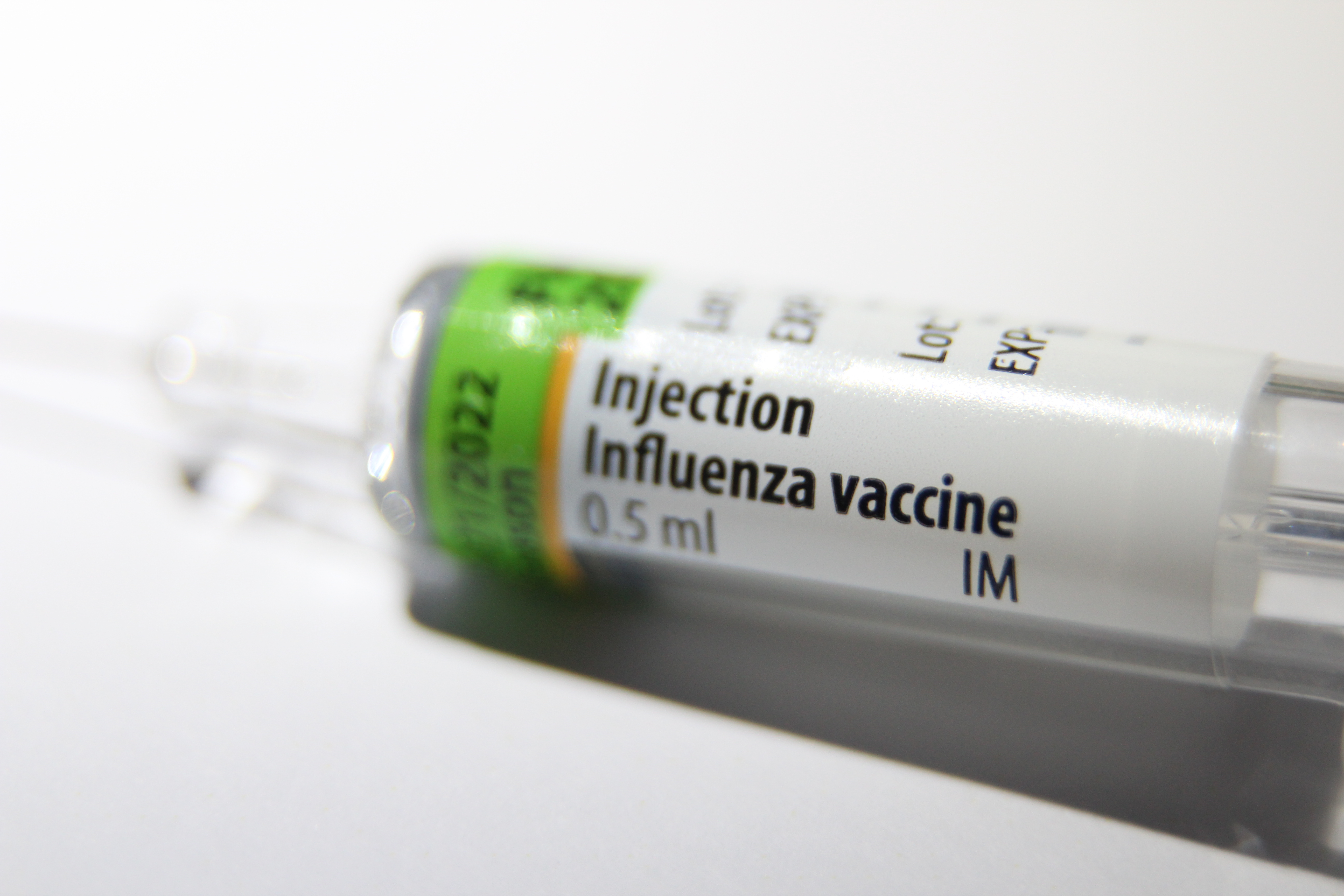 A syringe of influenza vaccine